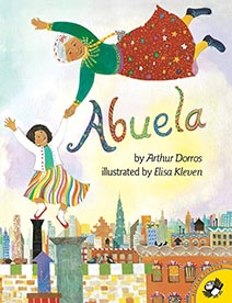 Illustrated book cover Abuela features a young girl reaching up to her grandmother, who is floating away.