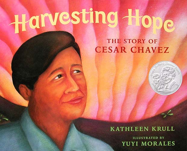Illustrated book cover of Harvesting Hope: The Story of Cesar Chavez