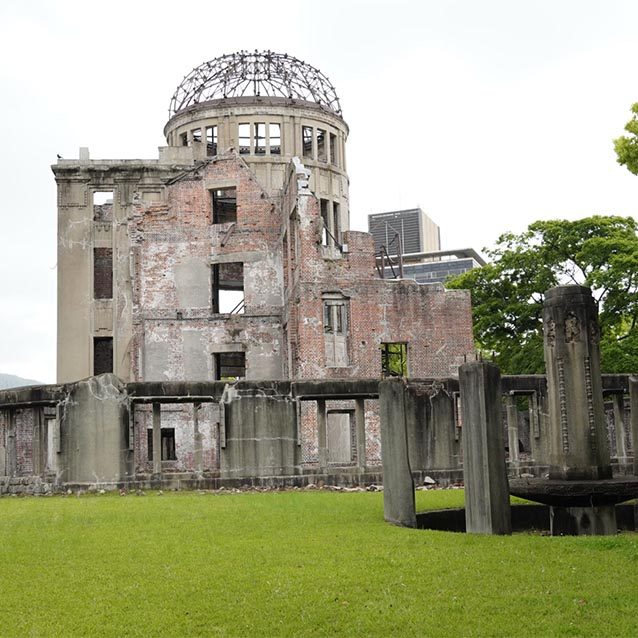 A domed building in ruins after an atomic bomb blast