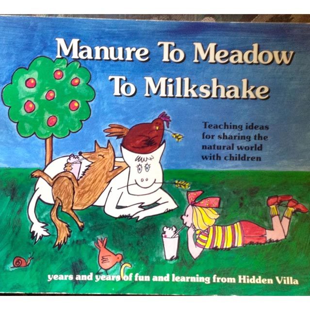 Illustrated children's book cover depicting a girl laying on the grass sipping a milkshake. Also laying on the grass with here are a cow, fox, and chicken