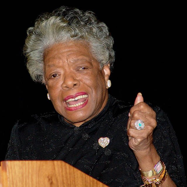 Maya Angelou speaks at a podium in Baltimore.